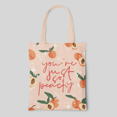 Peach colour designed tote bag with watercolour peach illustrations and lettering quote