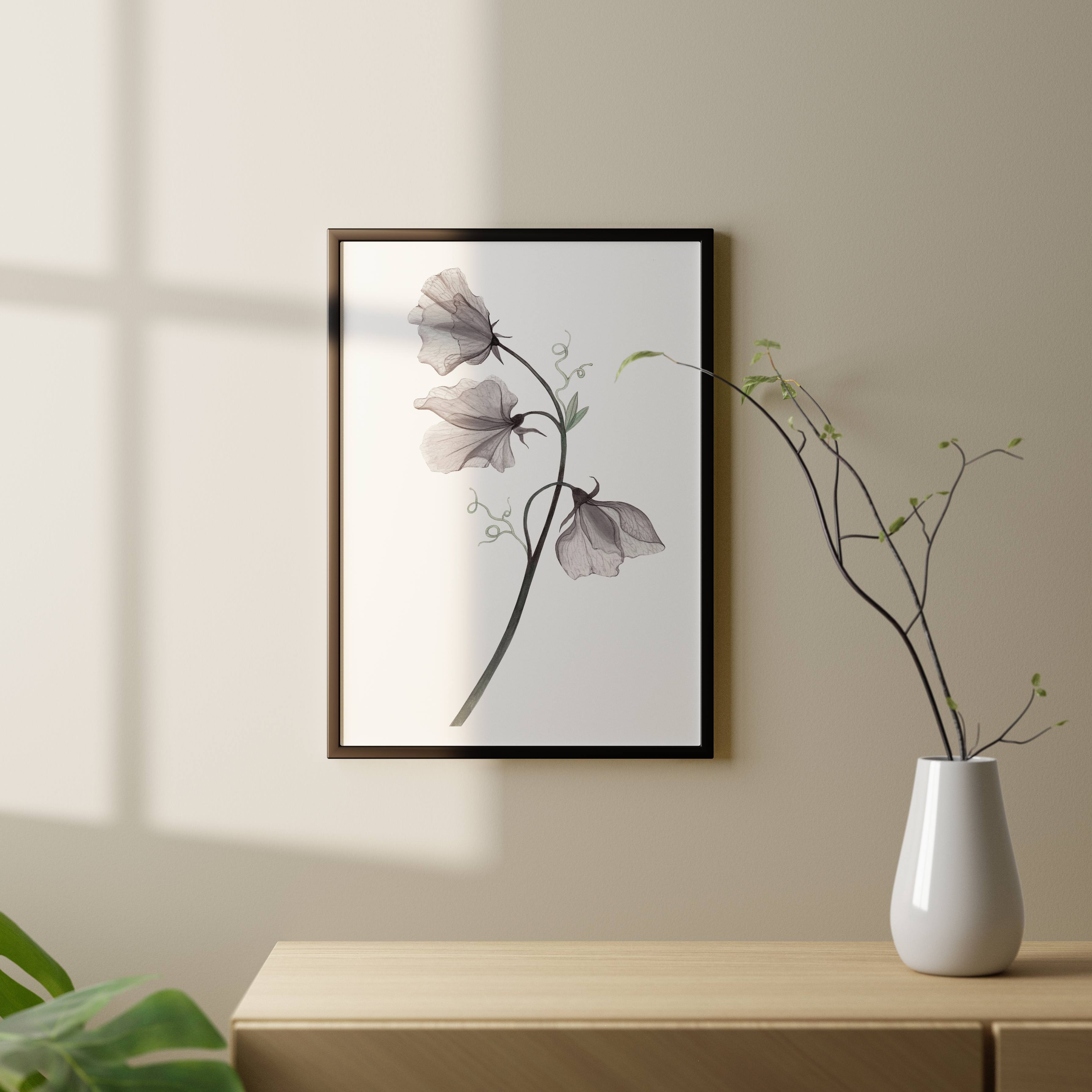 White canvas with three black flowers with translucent petals