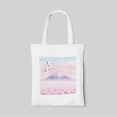 White designed tote bag with two cranes flying over fuji mountain and cherry blossom trees landscape, front side