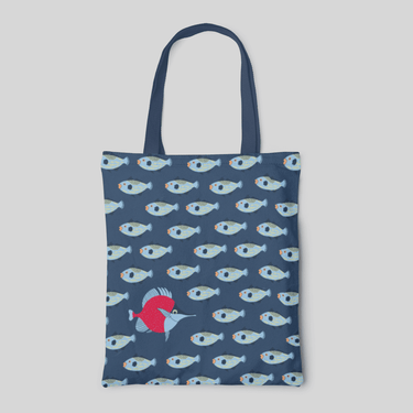 Blue tote bag with repeated fish pattern and one red swordfish