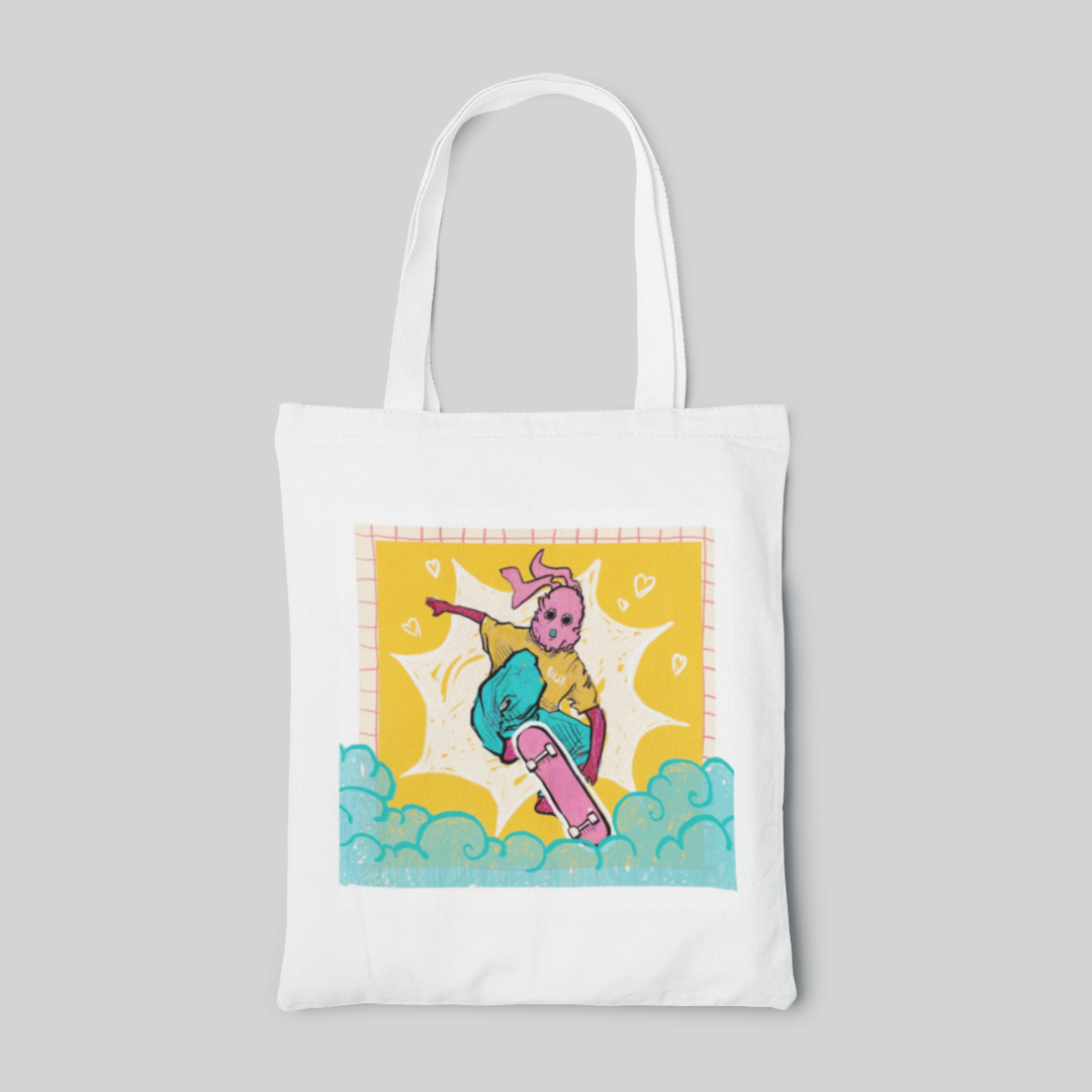 White lowbrow designed tote bag with blue smoke and pink skater in a yellow shirt on a picture print, front side