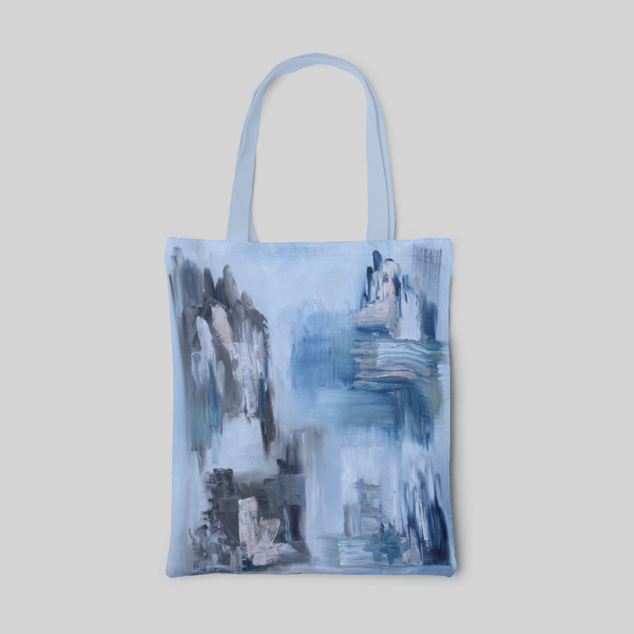 light blue abstract designed tote bag with different shades of blue and grey, front side