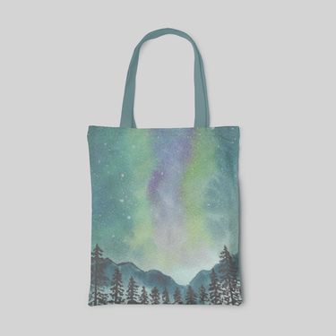 green designed tote bag with watercoloured aurora in the forest, front side