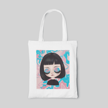 lowbrow designed white tote bag with pink and blue background, a black bob hair girl closing her pink and blue eye shadow eyes, front side