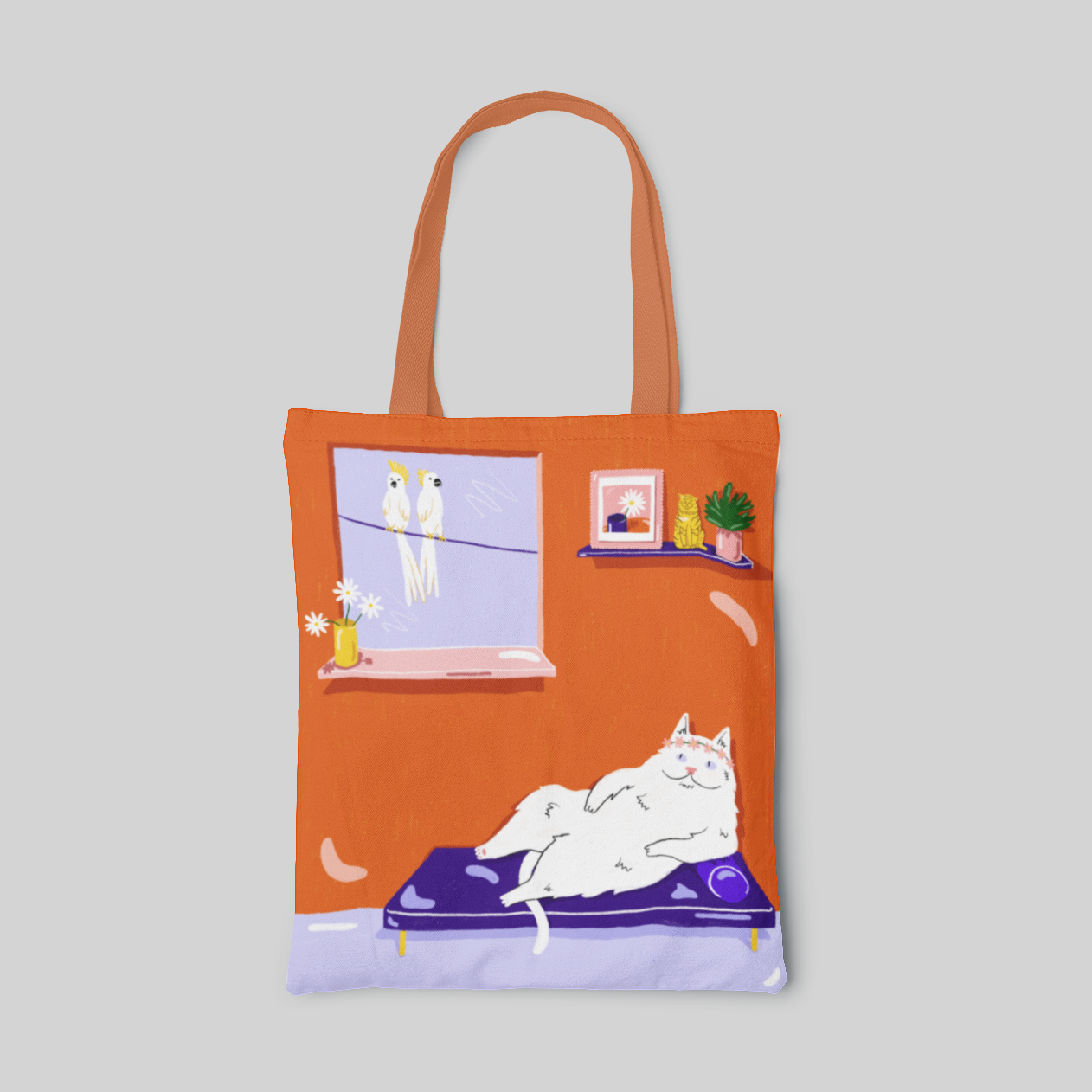 Orange animal designed tote bag with white cat lying on the bed and two white birds on the window, front side