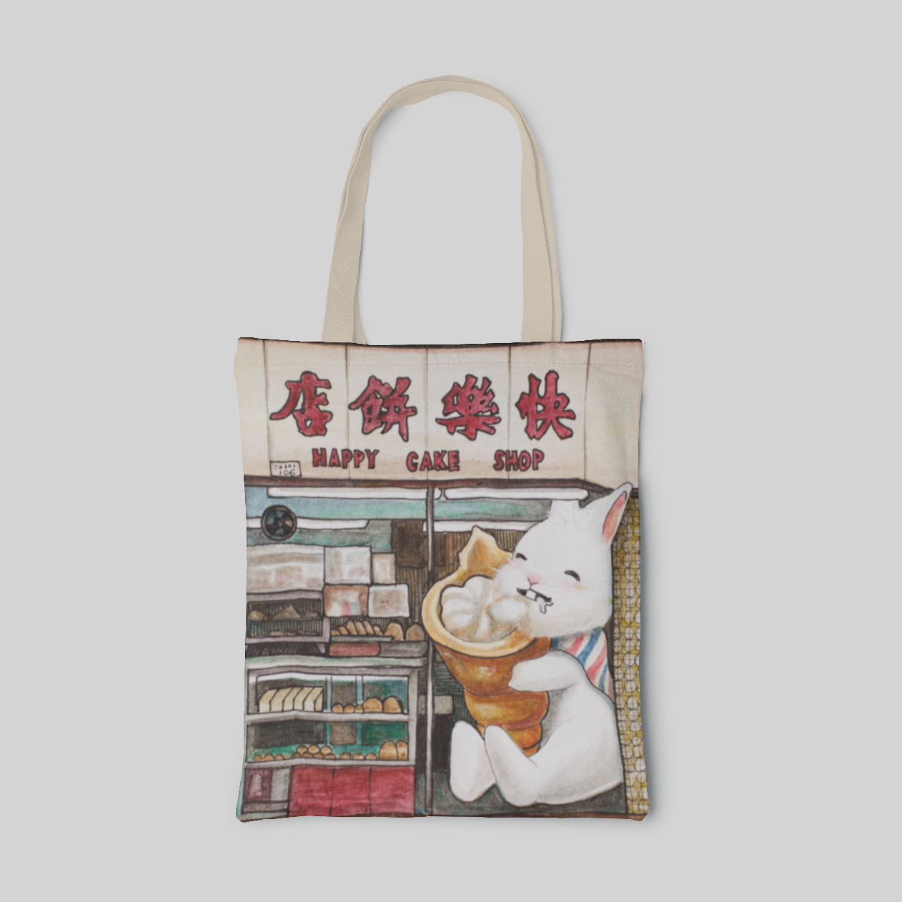 lowbrow designed tote bag with a white rabbit eating creme cornet in a bakery, front side