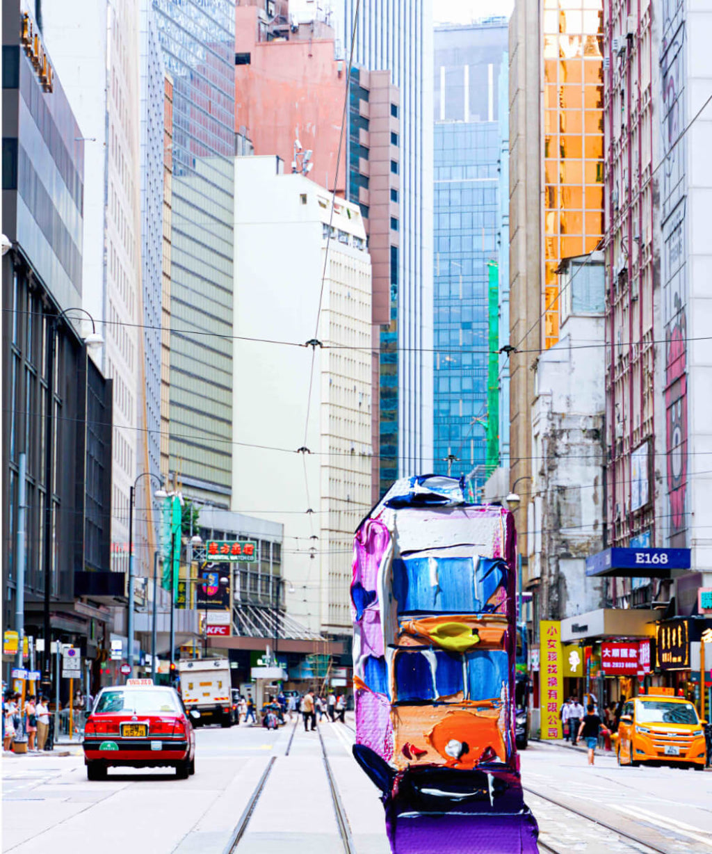 Colourful Hong Kong with pink truck and buildings 