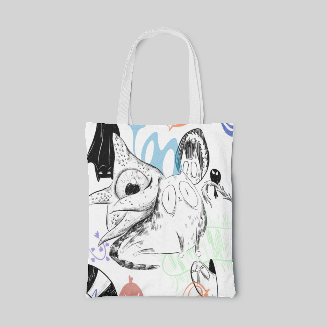 White lowbrow designed tote bag with cartoon cat and abstract shapes skeches, front side