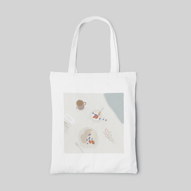 White designed tote bag with Morandi colour, afternoon tea themed pancake, fruit bowl and tea illustration, front side