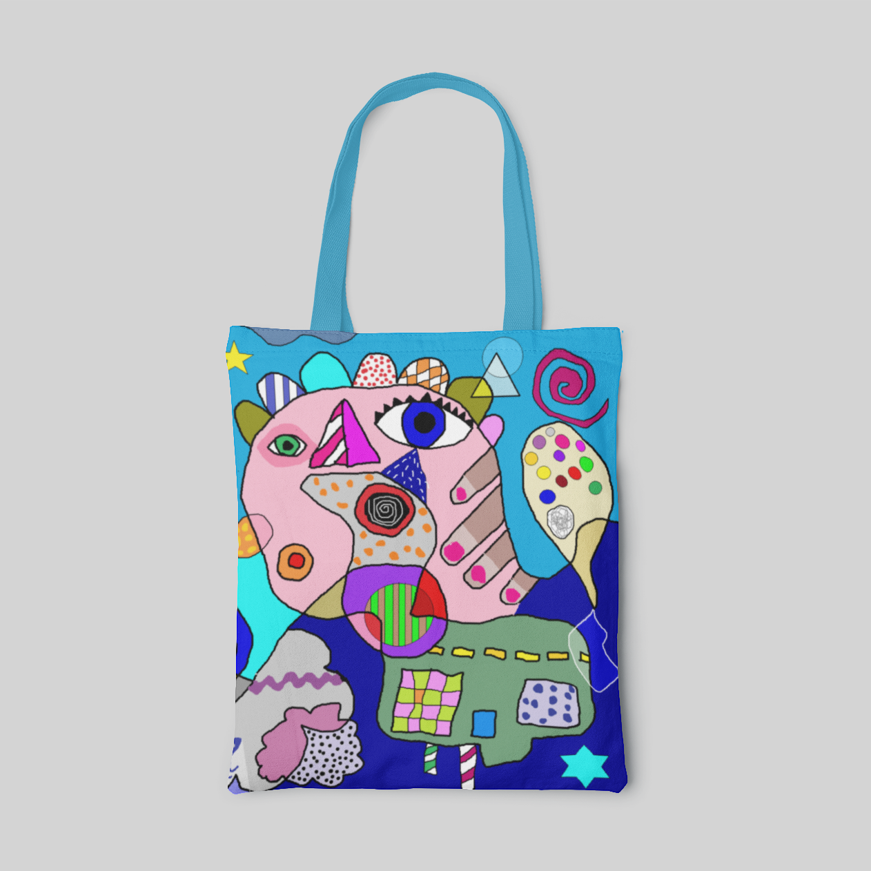 Blue lowbrow designed tote bag with abstract drawing and bold, strong colours , front side