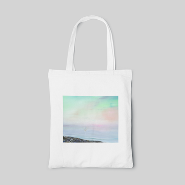 White designed tote bag of sea with green pink and blue ombre oil painting, front side