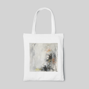 white abstract designed tote bag with blanch base colour, layering with black, orange, yellow and blue shades and highlights, front side