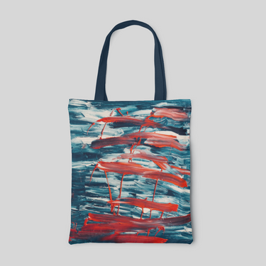 a deep blue abstract designed tote bag with blue, white and red strokes, front side