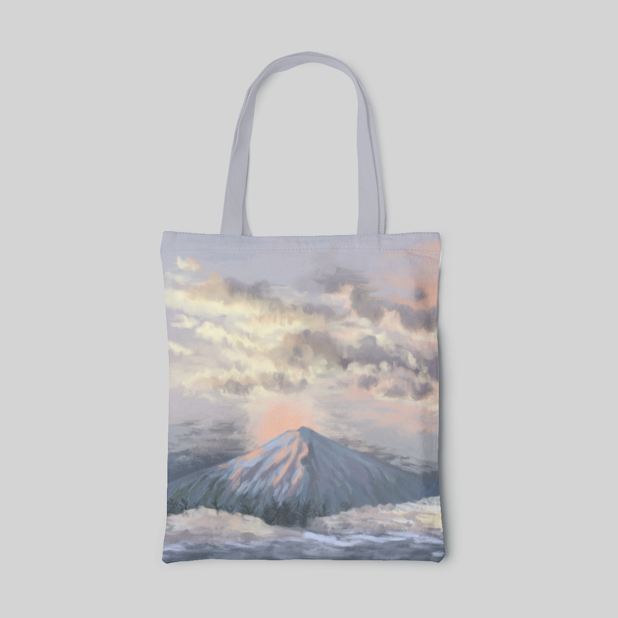 nature designed tote bag with pastel themed fuji mountain landscape and clouds, and a coral sun rising up behind the mount fuji, front side