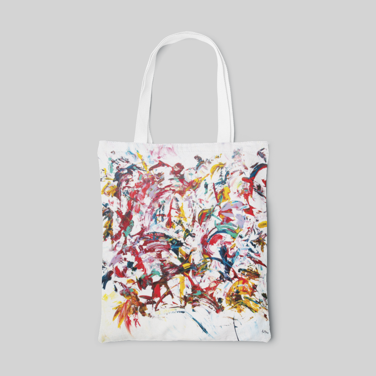 white abstract designed tote bag brushes with many vivid colours, front side