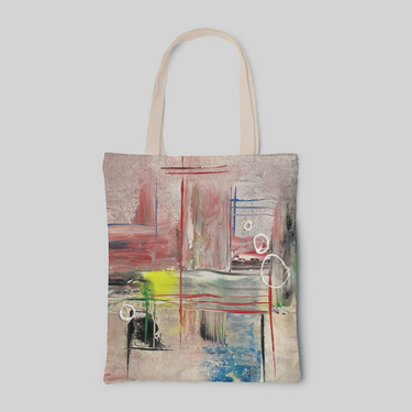 abstract designed tote bag with blanch colour base and red, yellow, green, blue, black and white strokes and splashes, front side