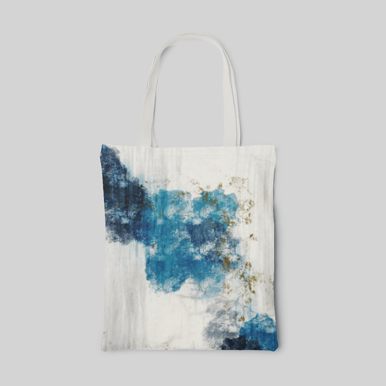 abstract designed tote bag of tapping different shades of blue and splashing yellowish green colour on a white base, front side