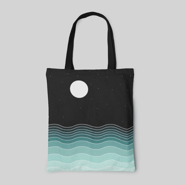 Black to tiffany blue gradient designed tote bag with moon and wave patterns, front side